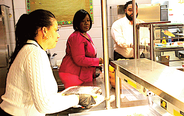 Top: Staff, city officials, and Abrams Elementary Royal Court. Next: Ms. Allen, Commissioner Tyson and helpers serve a memorable Valentine’s Dinner.
