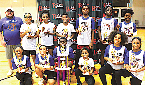 West Hill Elementary winners pose with trophies and awards.