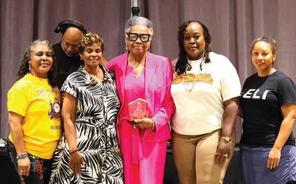Mrs. Alicia Johnson Williams, Commissioner Tyson and city officials pose with Ms. Brenda Hong at Juneteenth event.