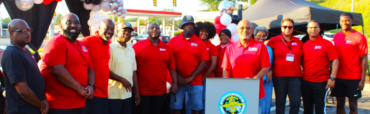Alton Woodard, the center's first director, with director Makeda Smith and staff during the anniversary celebration