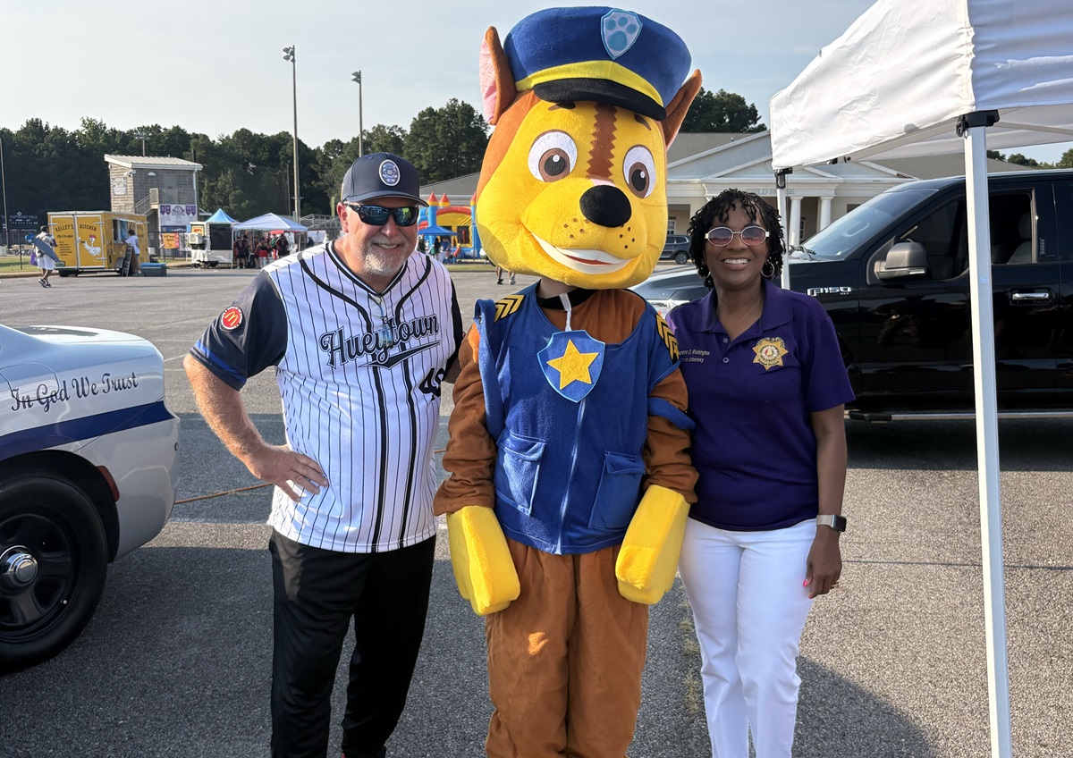 Hueytown Police Chief Michael Yarbrough, Chase from Paw Patrol and Bessemer Cutoff District Attorney Lynneice Washington at National Night Out.