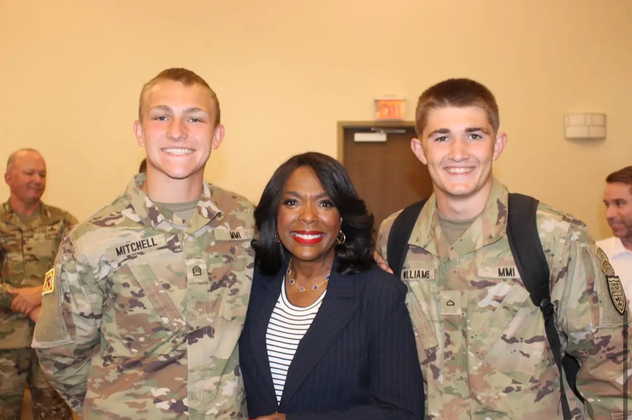 Sewell with Marion Military Institute cadets at the session