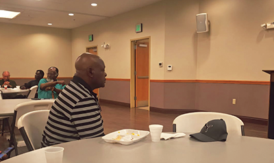 Dr. Stone engages in a testimonial with a prostate cancer survivor