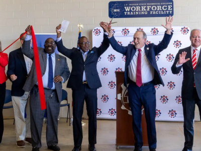 Officials raise the ribbon at the new J.F. Ingram State Technical College workforce training facility at the Perry County PREP Center on Sept. 23.(above)